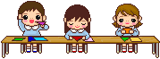 机に向かって色紙をする子どもたち